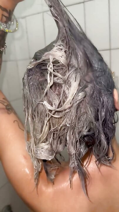 Washing Hair with New Mask Shower After Long Day