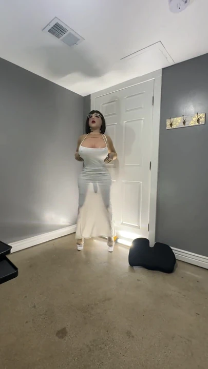 Iconic moment from "Hot trans cd in cute white dress teasing huge tits and ass"