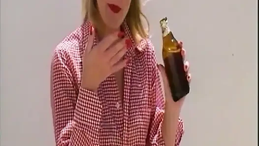 Blonde Inserts Glass Bottle Deep in Her Pussy