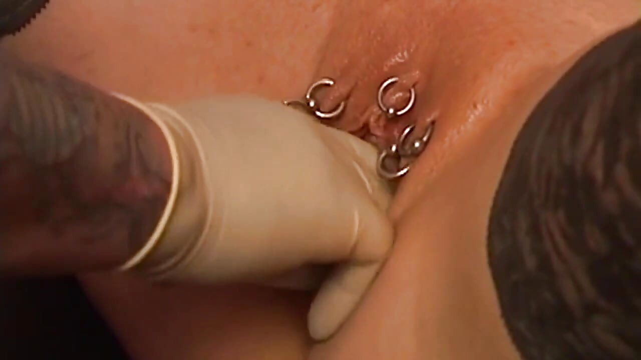 Tattooed Dom Fists Mature Blonde in Chains