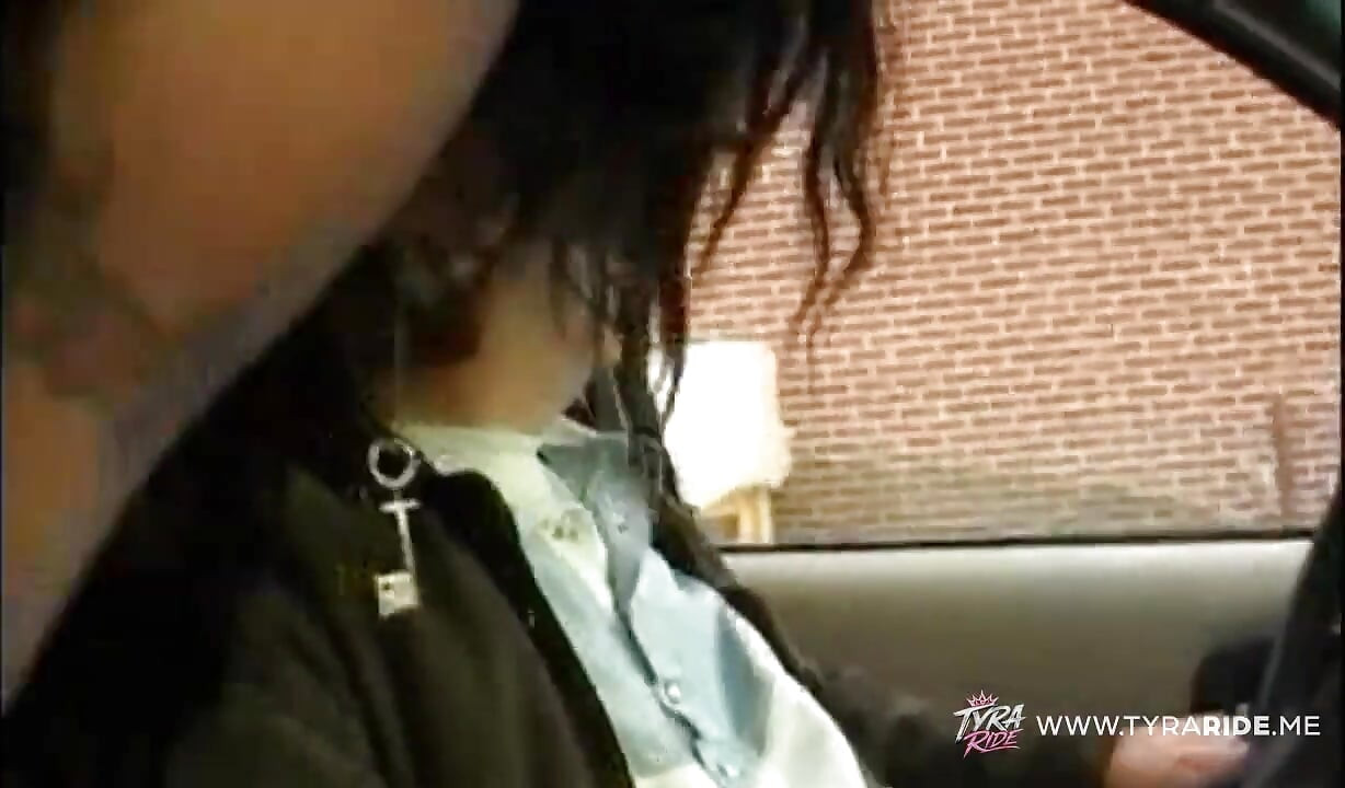 Brunette with Tattoos Gives Blowjob in Car Backseat
