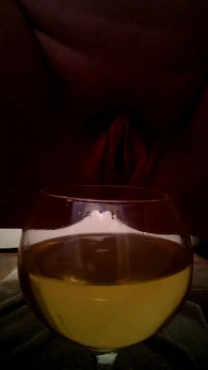 girl fills wine glass