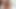 Spraying a big cumshot on big natural tits