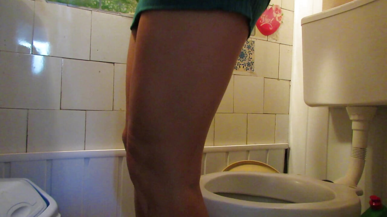 I pee in the toilet and stuff my thong into my cunt