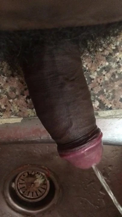Indian BIG black cock pissing in sink