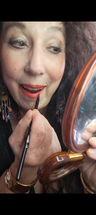 Why do women put on lipstick?