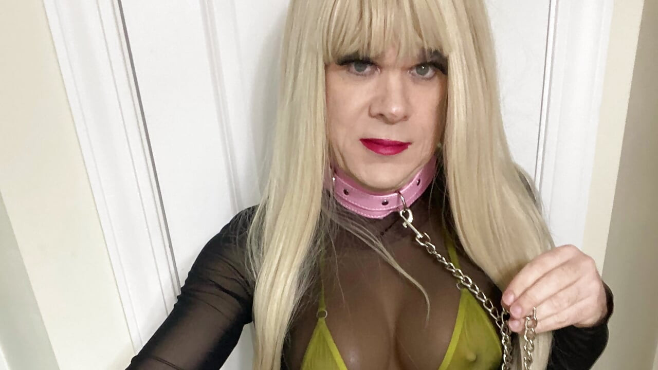 Slutty blonde whore CD Madison crossdressing while being chained for bdsm bondage