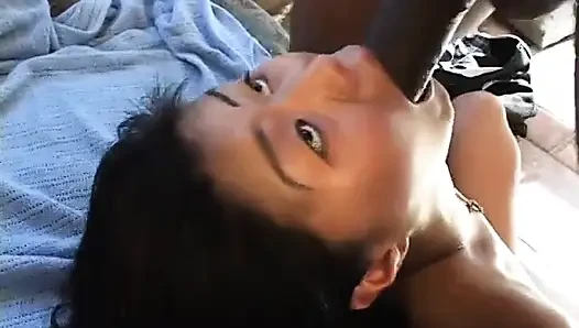 Asian babe with natural tits deep throats a huge black cock before banging