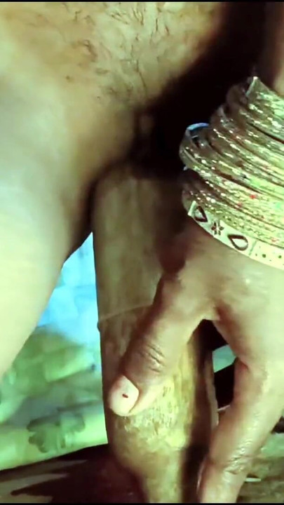 Unforgettable moment from "TROROSE Indian Bhabhi Enjoys Belan In Her Cat In Desi Style"