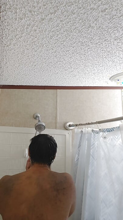 Cleaning Up in the Tub Bathing Solo and Rinsing Off