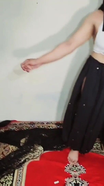 Emotional moment from "Arabic sexy hot girl wearing black hijab in house doing sensual dance, Desi Indian slut Amrozia"