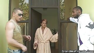 Redhead granny gets 3some with BBC and white cock