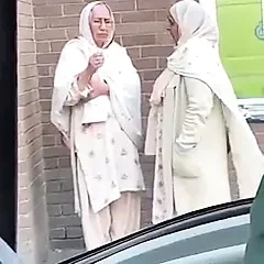 Old woman smoking Paki