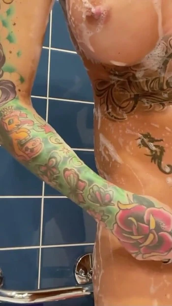 Captivating moment from "German Amateur Teen Anni Angel - Shower pussy shaving with close-up"