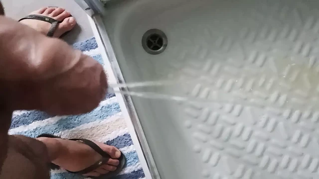 Dick Pissing On The Toilet