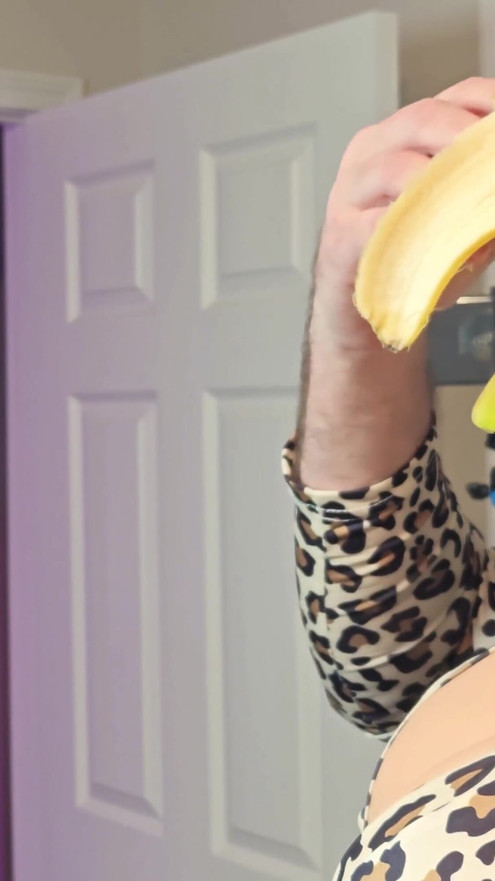 Gigantic Fake Tits Crossdresser Deepthroats a Banana