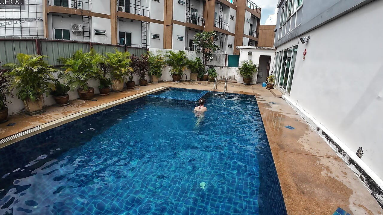 watch us playing in our swimming pool