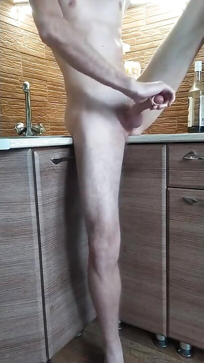 Handjob in the kitchen