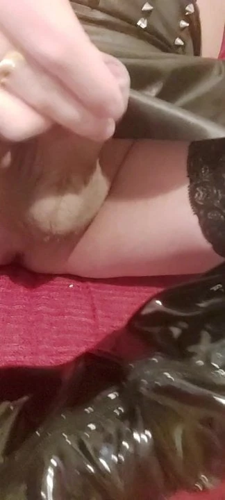 Tranny jerking of her little cock, cum on black patent boots