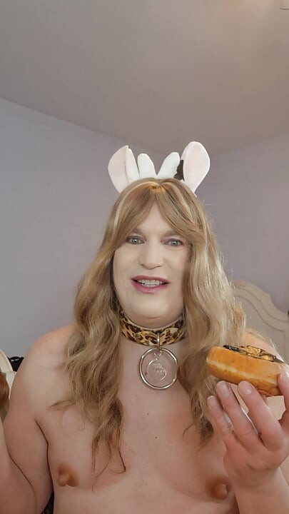 Sticking my tounge in a creamy chocolate doughnut