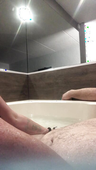 Flab fun in a jacuzzi! Slim n sexy Rachel Wriggler has slippy sliding soapy fun with a big chubby bear