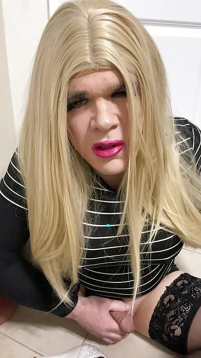 Part 2 of Sexy Crossdresser trans female teases with fake pussy in lingerie and stockings