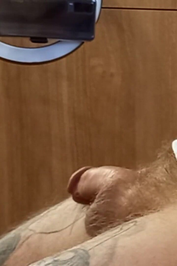 close-up cumshot from manual penis stimulation by a fat woman