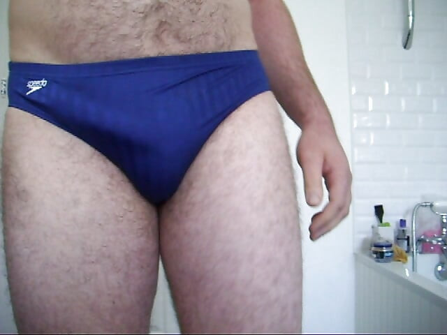 Trying on speedo and adidas swim trunks briefs. Masturbate and cum in speedo then put them on.