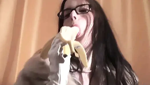 Spex brunette talking dirty while eating banana