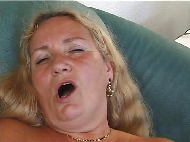 Horny blonde mature shoves remote where sun don't shine