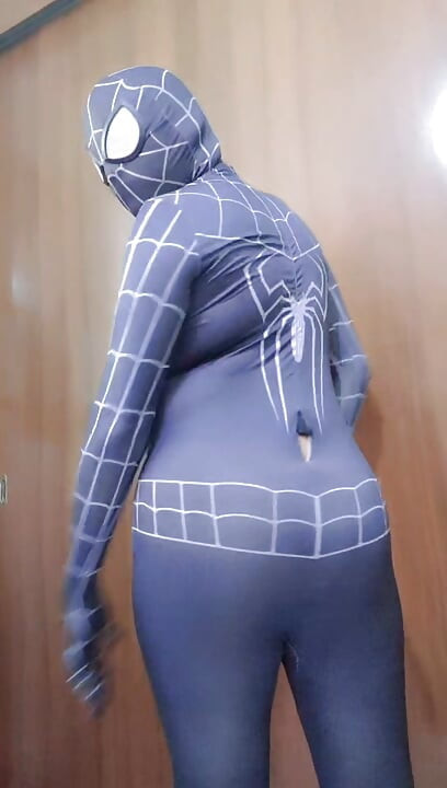 Spider-Man strips naked and shows his ass.