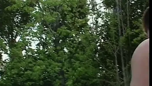 Two horny studs taking turns to fuck a busty blonde outdoors