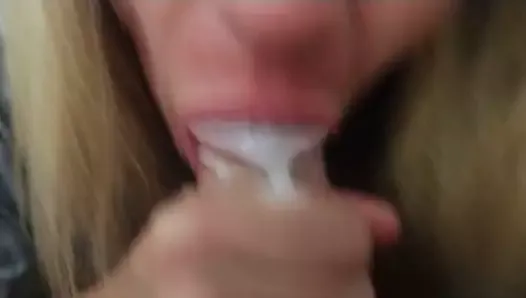 Lady J blows with sore mouth from dental work
