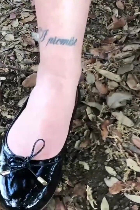 Hot teen smoking in a park