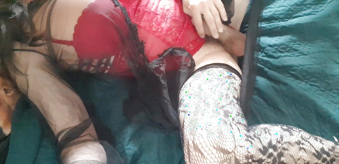 I'm wearing a red bodysuit, black stockings and a sexy robe.