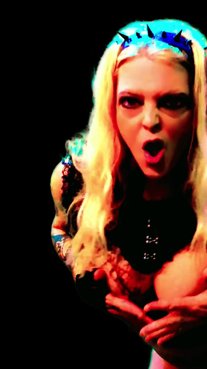 Iconic moment from "Mistress of Darkness - 23 is the Number of the Flame"