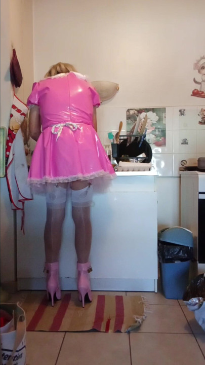 Sissy maid does her Mistress's household chores