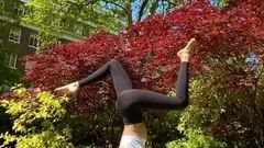 Noel Capri Berry doing yoga in black tights
