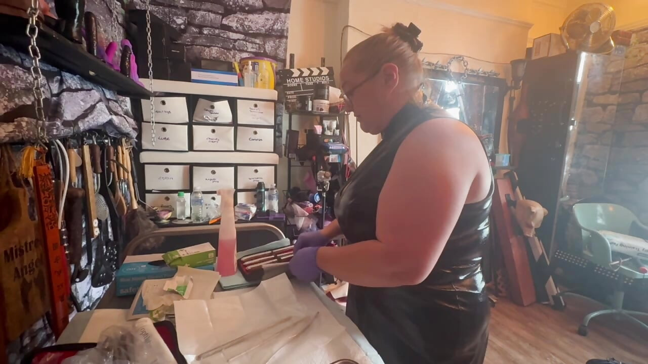 Preparation for sounding with Domina Satana & Mistress Izar