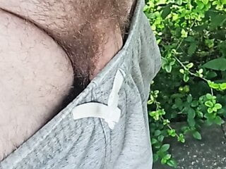 Playing outdoors with flaccid cock