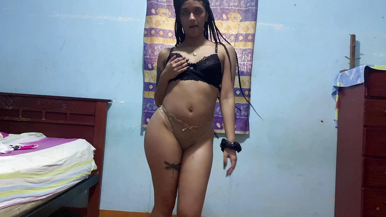 Latina strips and shakes her ass