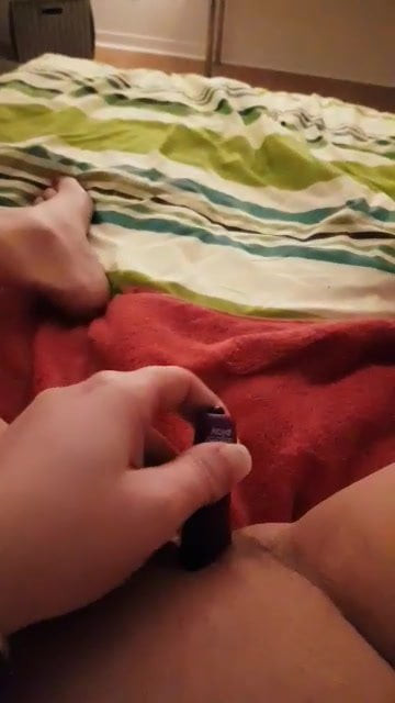Masturbating