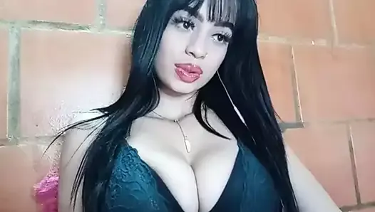 Busty exotic Perla pulls out her tits and sucks her nipples