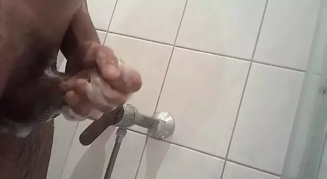 Taking a shower and wanking