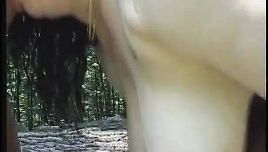 Mature brunette with big tits fucks outdoors
