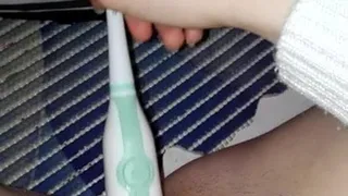 Girl mastubating with toothbrush