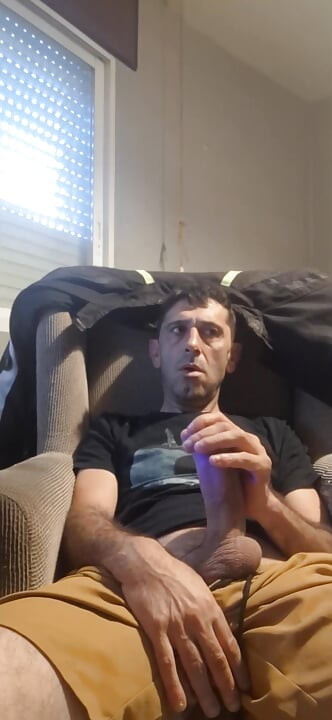 Guy masturbating on the sofa