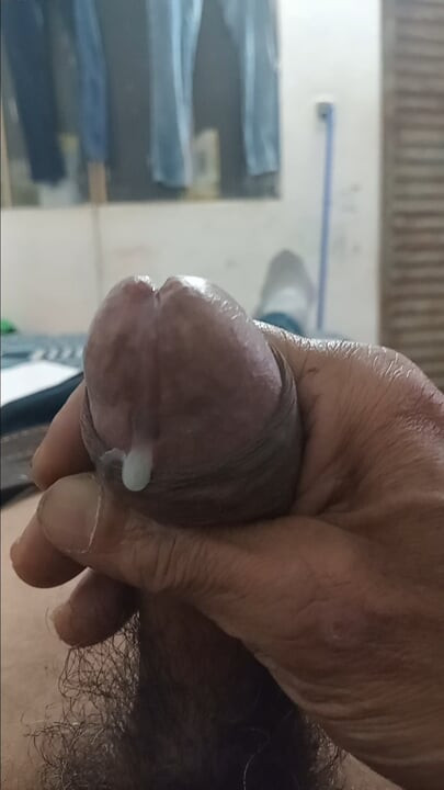 Masturbating