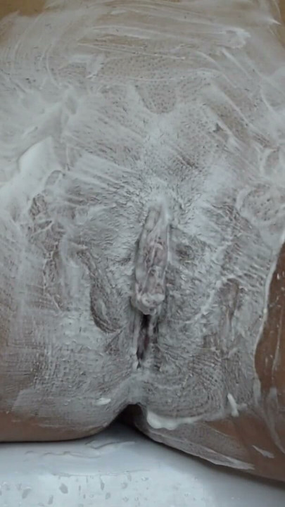 Close-up of shaving the vagina with a trimmer and a razor. | Clip 1