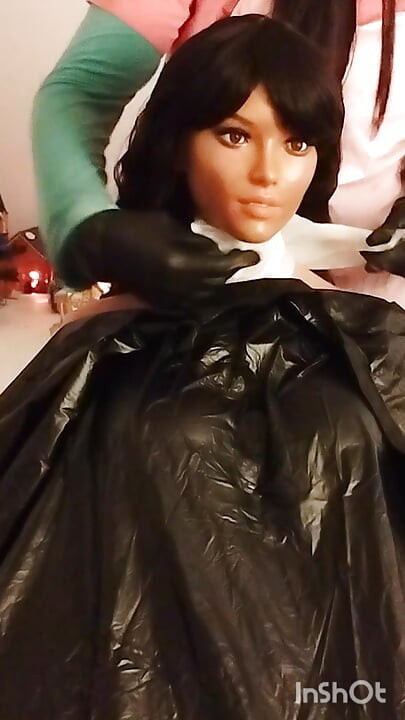 Ebony sex doll Nikki wears barberette capes